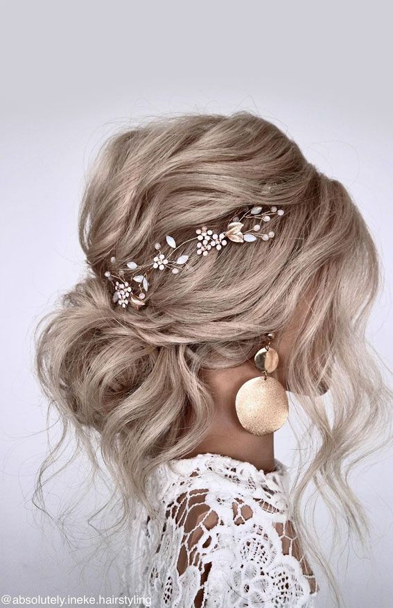 50 Best Updo Hairstyles For Trendy Looks in 2022 _ Textured low bun and face-framing Inspiration Pictures curls